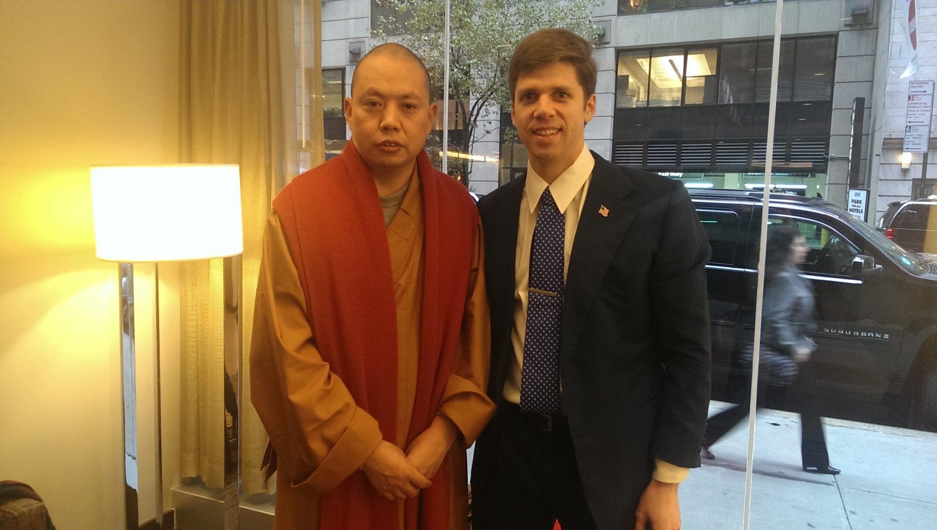 Buddhist Master Yancan ???? (left) and Chinese conference interpreter Philip Rosen (right) stand together during a Chinese delegation visit to Washington, DC, in 2014. Rosen provided consecutive and simultaneous liaison interpreting between Chinese and English.