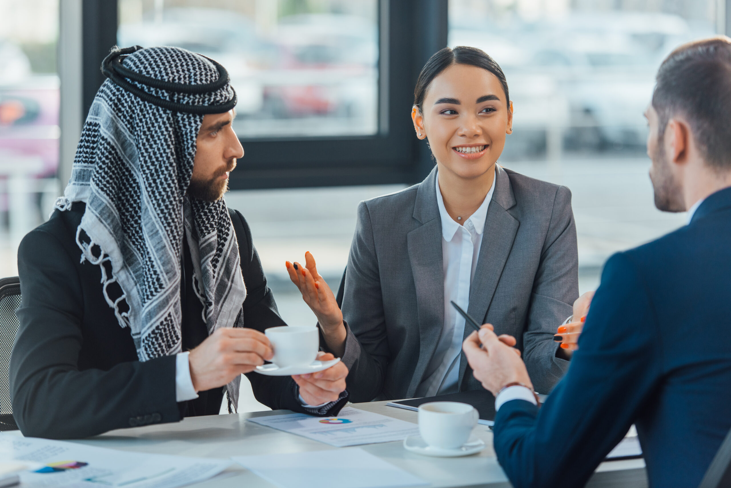 Business team with translator discussing in office meeting